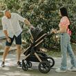 Carucior transformabil 3 in 1 Coccolle Melora, Cadru aluminiu, Roti mari, Pliere compacta, Maner ajustabil, Cos auto iSize, Geanta mama, Husa picioruse, Husa ploaie, Plasa insecte, Diamond Black